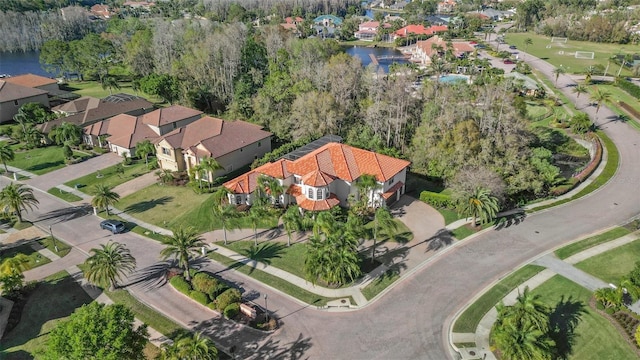 bird's eye view featuring a residential view and a water view