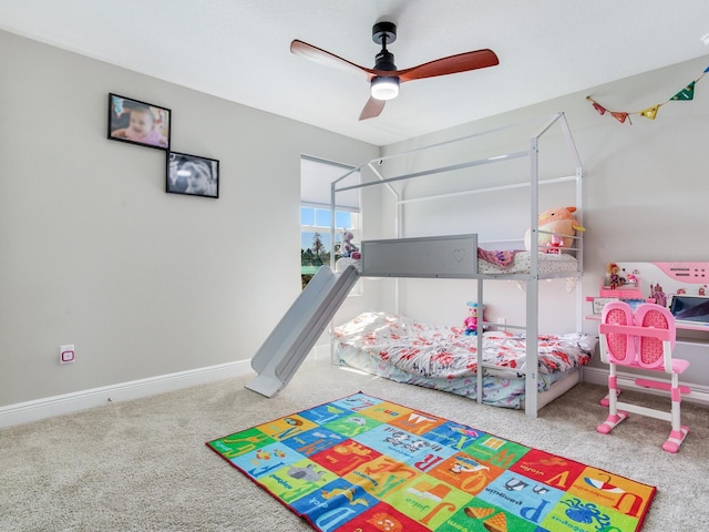 bedroom featuring carpet, baseboards, and ceiling fan