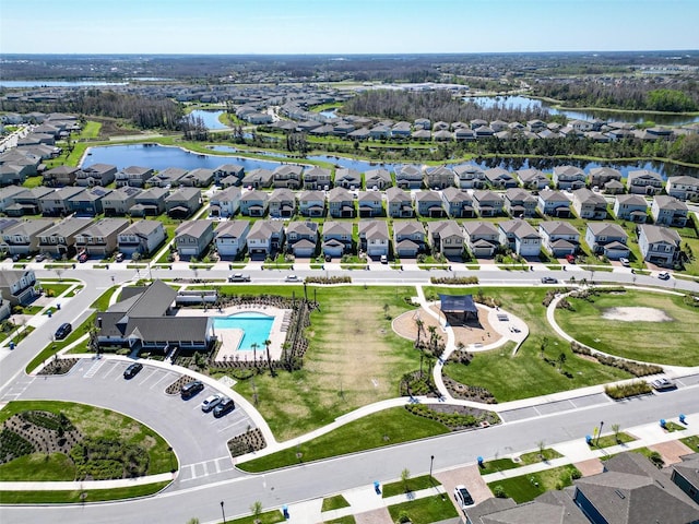 aerial view featuring a residential view and a water view