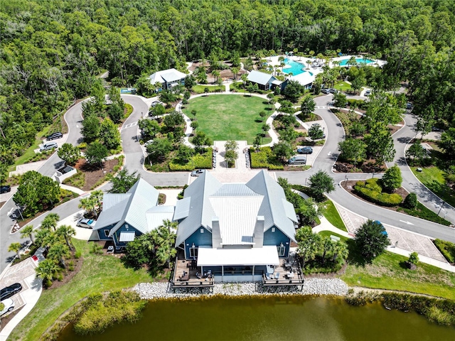 birds eye view of property with a water view