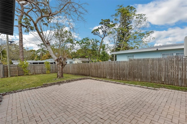 view of patio with a fenced backyard