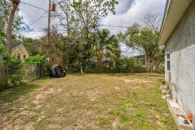 view of yard featuring a fenced backyard