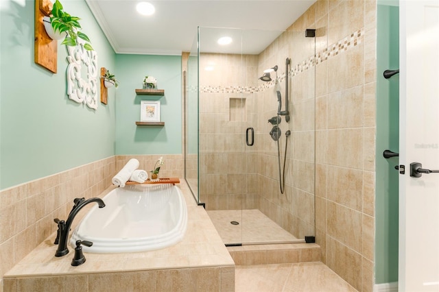 bathroom featuring recessed lighting, a garden tub, a stall shower, and crown molding