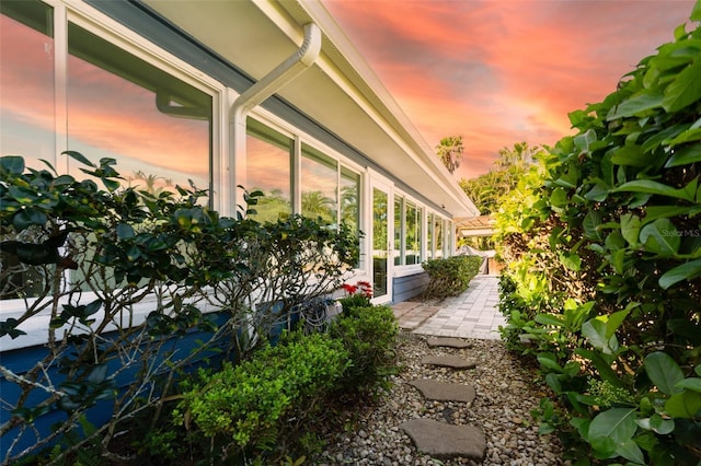 view of property exterior at dusk