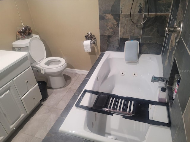 full bath featuring baseboards, vanity, toilet, and tile patterned floors