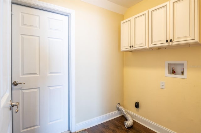 clothes washing area with baseboards, cabinet space, hookup for a washing machine, and dark wood-style flooring