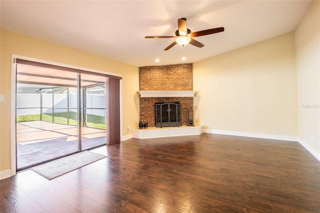 unfurnished living room featuring baseboards, ceiling fan, and wood finished floors