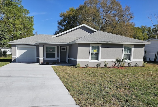 ranch-style home featuring a garage, concrete driveway, roof with shingles, a front lawn, and stucco siding