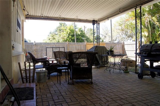 view of patio / terrace featuring a fenced backyard and area for grilling