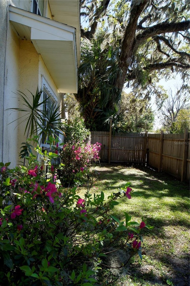 view of yard with fence