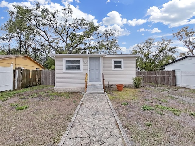 view of front of property with fence