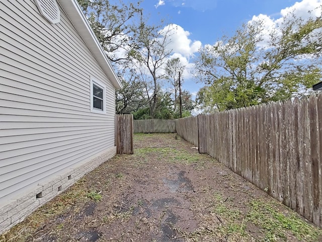 view of yard featuring a fenced backyard