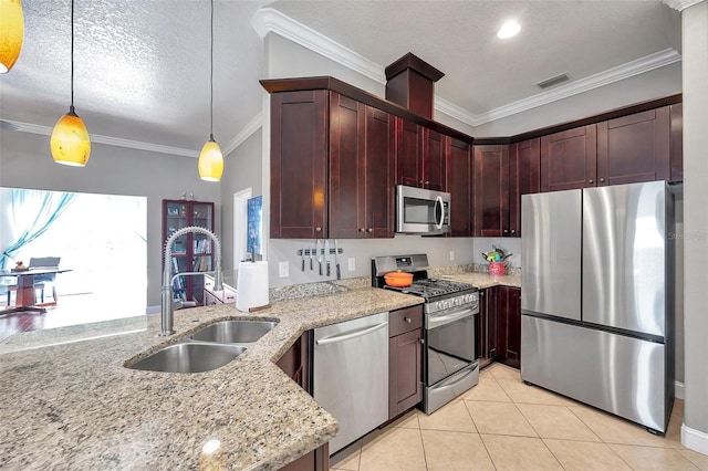 kitchen featuring light tile patterned floors, visible vents, light stone counters, stainless steel appliances, and a sink