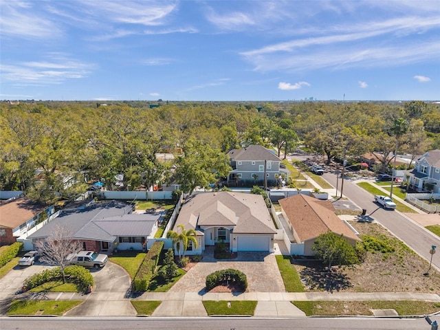 aerial view with a residential view and a wooded view