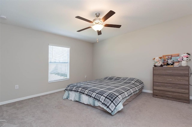 bedroom featuring carpet floors, ceiling fan, and baseboards