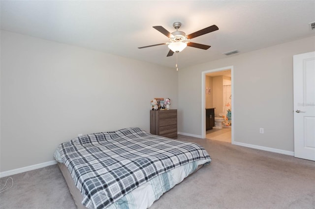 bedroom featuring light carpet, baseboards, and visible vents