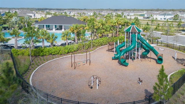 community jungle gym with fence