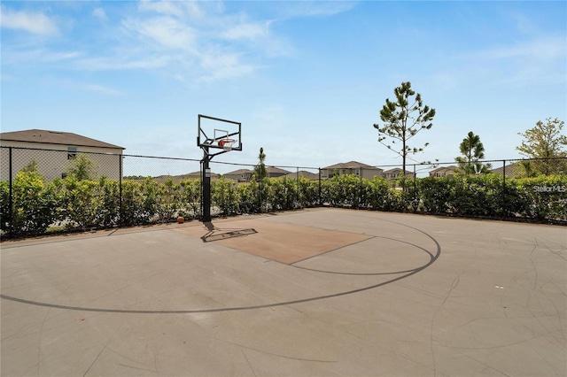 view of sport court featuring community basketball court and fence