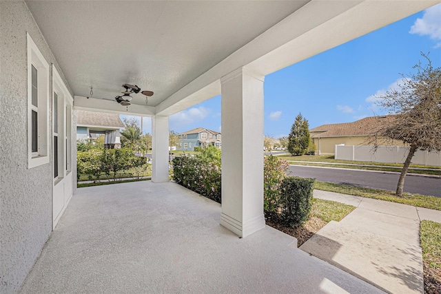 view of patio featuring covered porch and ceiling fan