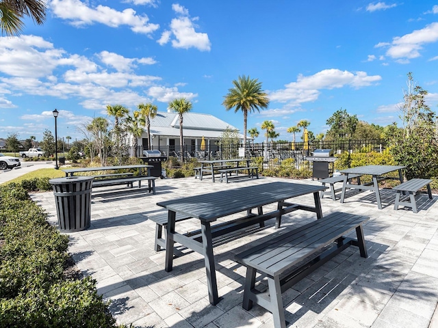 view of property's community featuring a patio