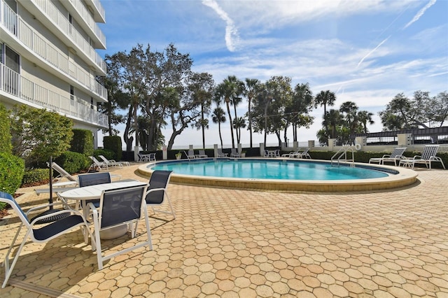 community pool featuring a patio