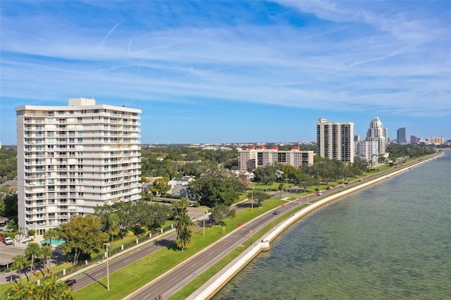 drone / aerial view with a city view and a water view