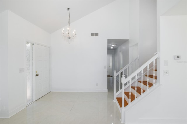 stairway featuring high vaulted ceiling, baseboards, visible vents, and tile patterned floors