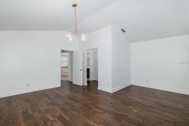 interior space featuring dark wood-style floors, a notable chandelier, visible vents, vaulted ceiling, and baseboards