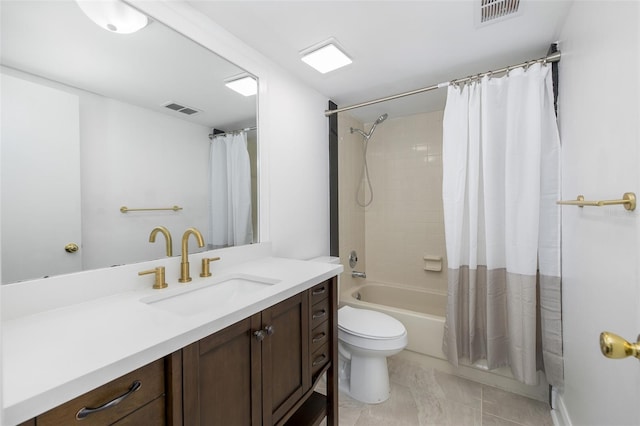 bathroom featuring toilet, visible vents, shower / bath combination with curtain, and vanity