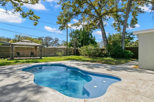 view of swimming pool featuring a gazebo, a fenced backyard, and a patio area