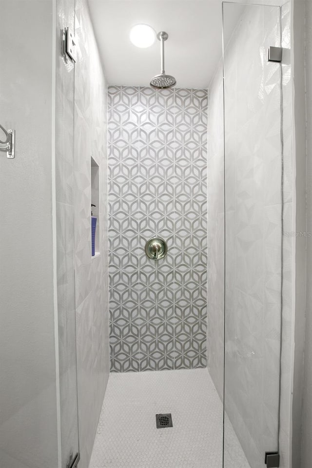 bathroom with a stall shower