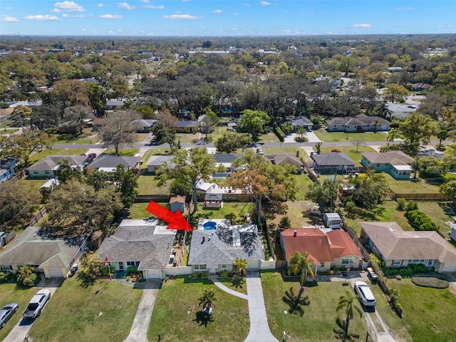 birds eye view of property with a residential view