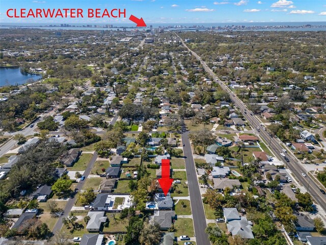 aerial view featuring a residential view and a water view