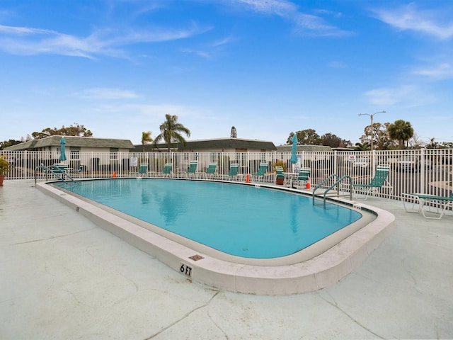 community pool with fence