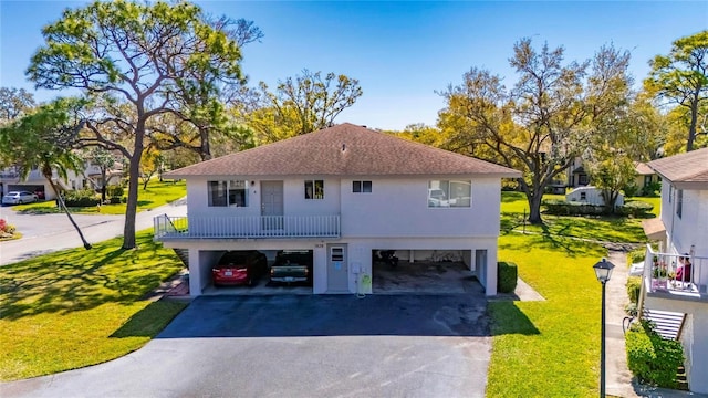 exterior space featuring a carport and driveway