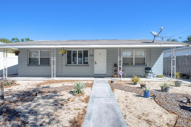 view of front of house with fence