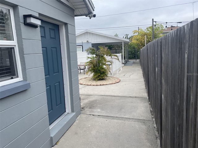 exterior space with fence and a patio
