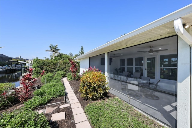 27150 Del Ln, Bonita Springs, FL 34135 - view of yard featuring a sunroom and a ceiling fan