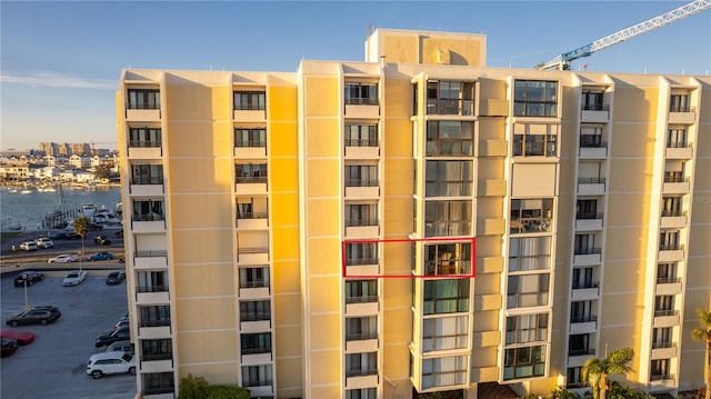 view of building exterior with a water view