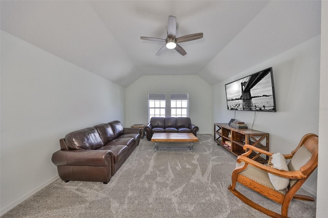 carpeted living room featuring lofted ceiling, a ceiling fan, and baseboards