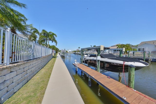 view of dock with a water view and boat lift