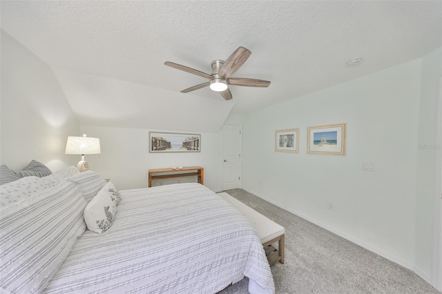 413 Islebay Dr, Apollo Beach, FL 33572 - bedroom featuring carpet floors, lofted ceiling, ceiling fan, a textured ceiling, and baseboards