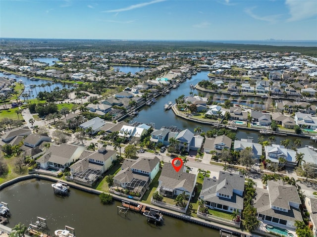 413 Islebay Dr, Apollo Beach, FL 33572 - aerial overview of property's location with nearby suburban area and a nearby body of water