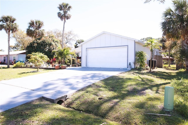 exterior space featuring concrete driveway