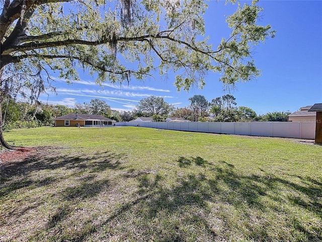 view of yard with fence