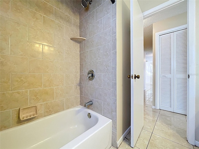 full bathroom with tile patterned flooring, tub / shower combination, and baseboards