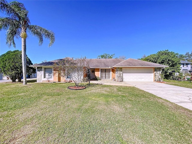 single story home featuring driveway, a front lawn, and a garage