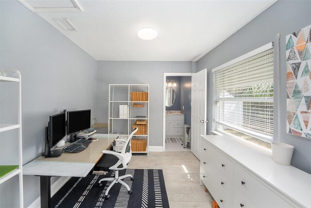2519 Southern Oak Cir, Clearwater, FL 33764 - office featuring baseboards, visible vents, and light wood finished floors
