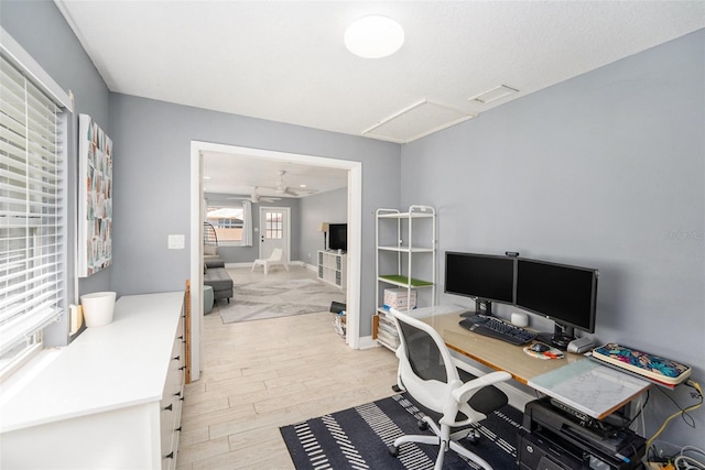 2519 Southern Oak Cir, Clearwater, FL 33764 - office space featuring attic access, visible vents, light wood-style flooring, and baseboards
