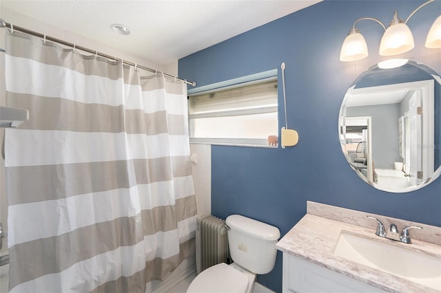 2519 Southern Oak Cir, Clearwater, FL 33764 - full bath with toilet, radiator heating unit, a shower with shower curtain, and vanity